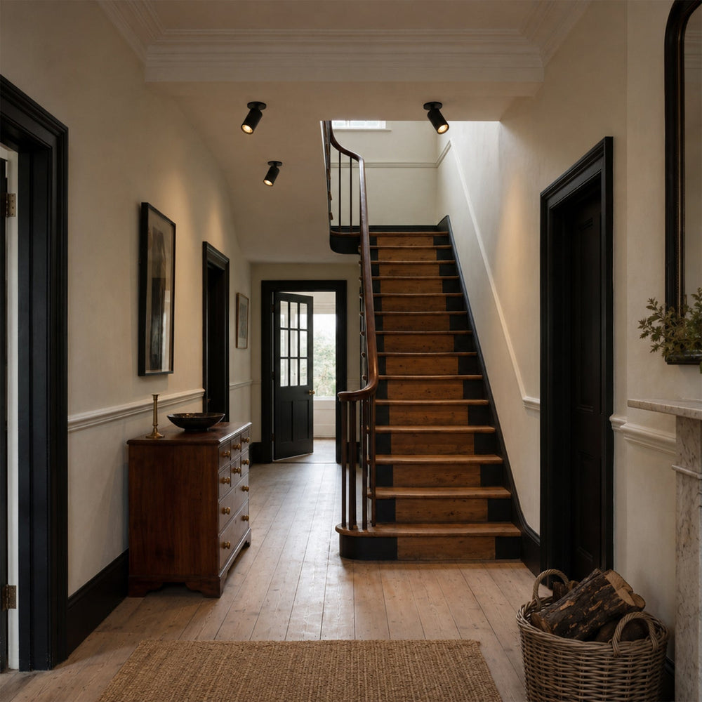 Core recessed spotlights in hallway next to staircase