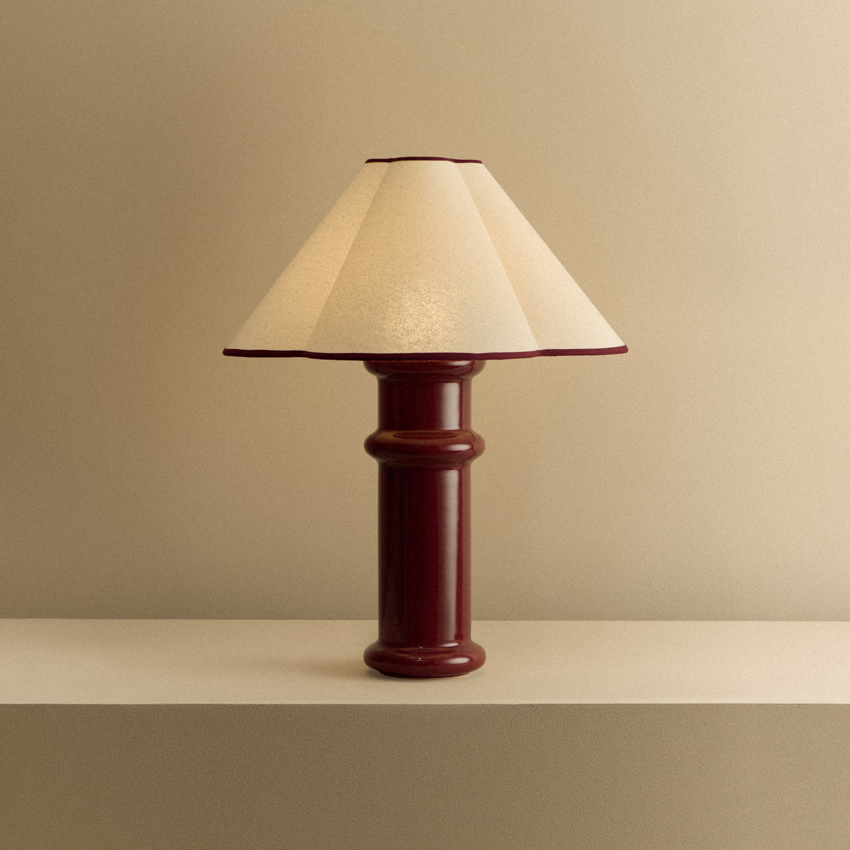 Heath Table Lamp in Port Red, lit