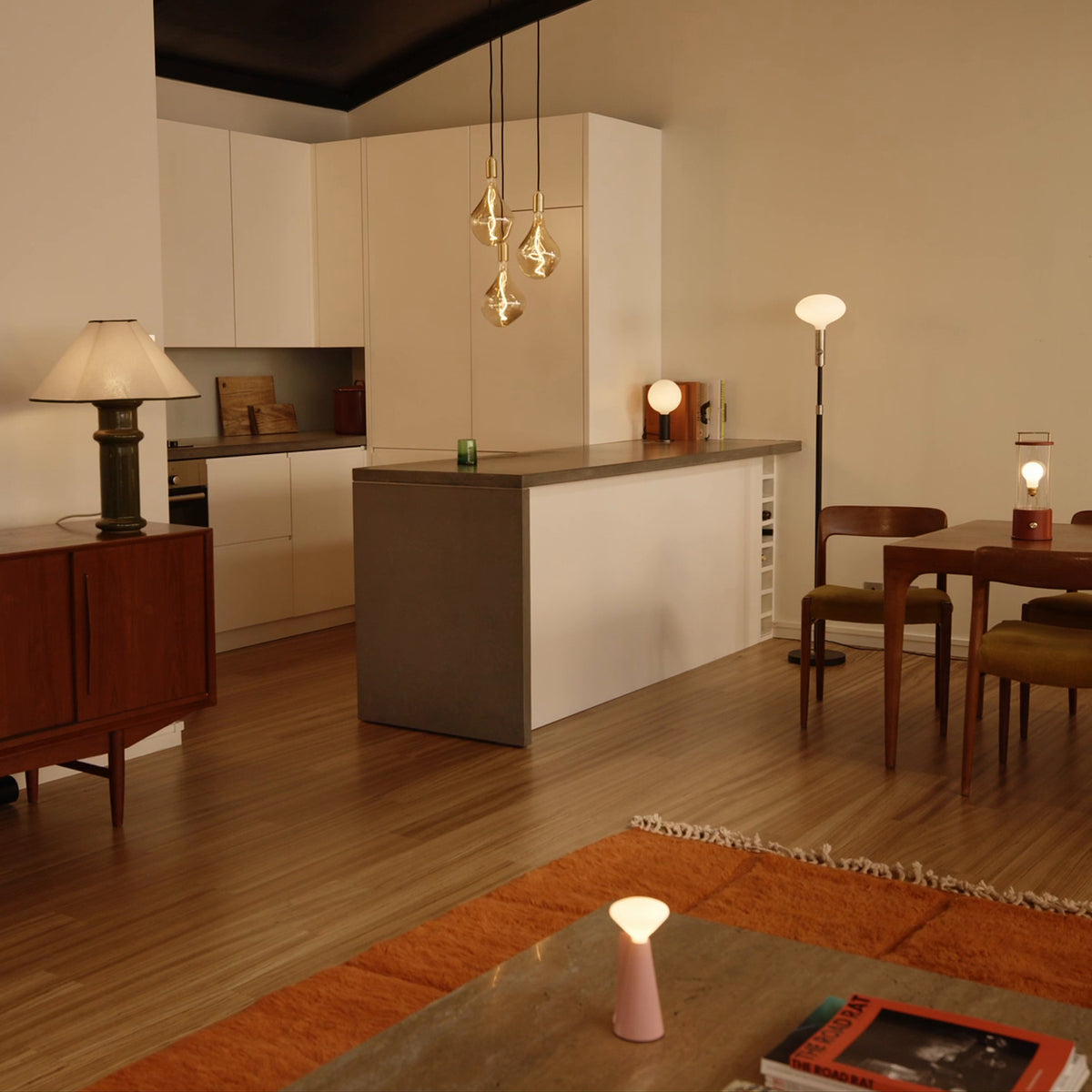 A warm, lamp-lit living space featuring Tala lighting