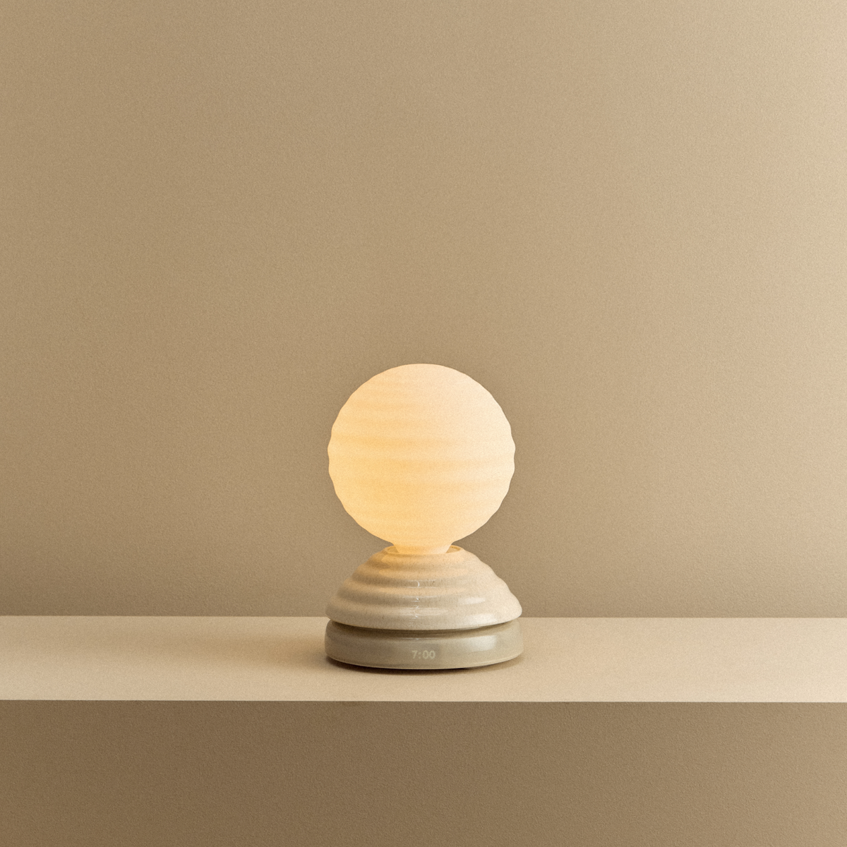 Wake Sleep Light glowing softly on a bedside